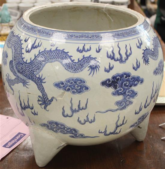 A massive Chinese blue and white dragon tripod censer, Qianlong mark and of the period (1736-95)